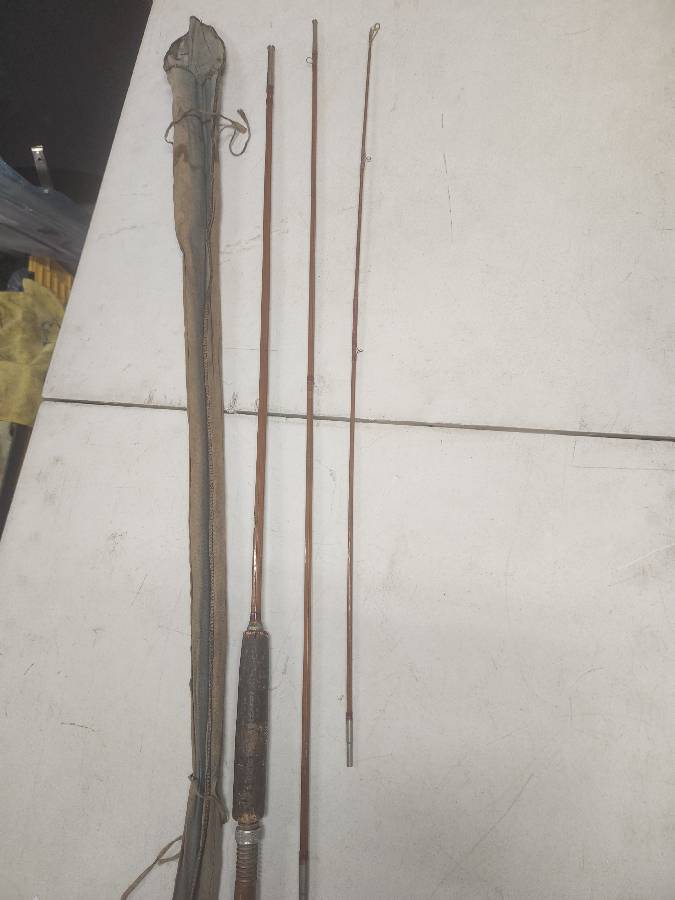 Sold at Auction: Three vintage bamboo fishing rods. 8' - 9